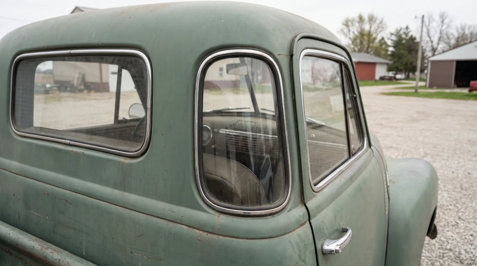 Rear corner window of a five window Advance Design Chevrolet truck cab