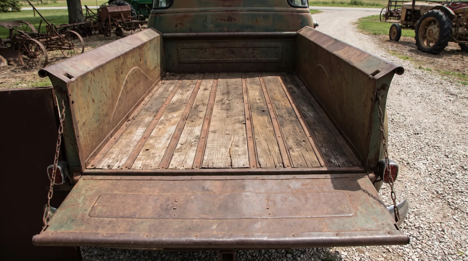 Wooden floor and steel bed strips in the stepside bed of an Advance Design Chevrolet pickup