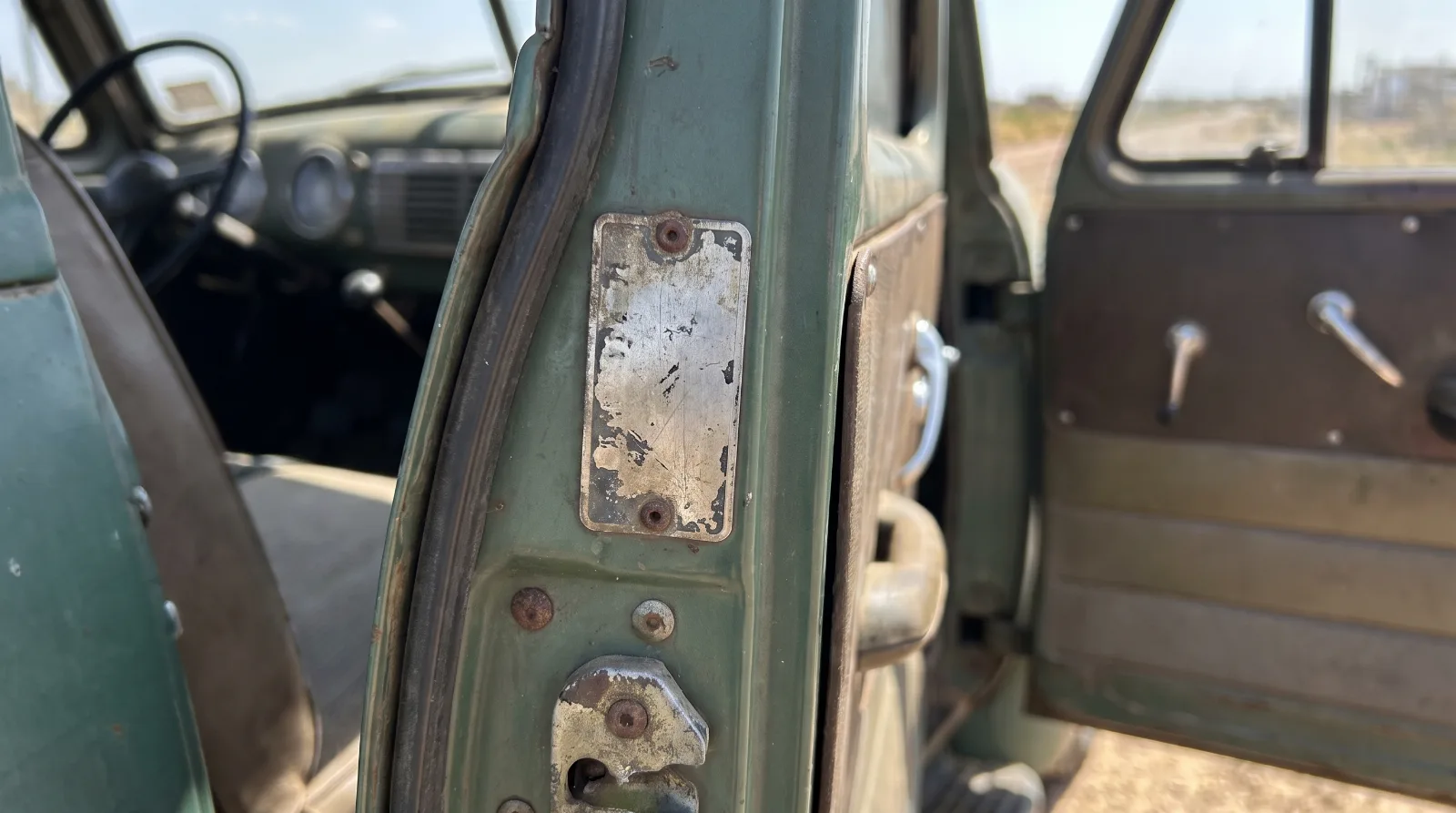 Serial number plate riveted to the door pillar of an Advance Design Chevrolet truck